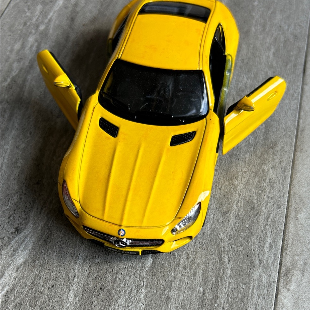 Yellow Mercedes-Benz Toy Car